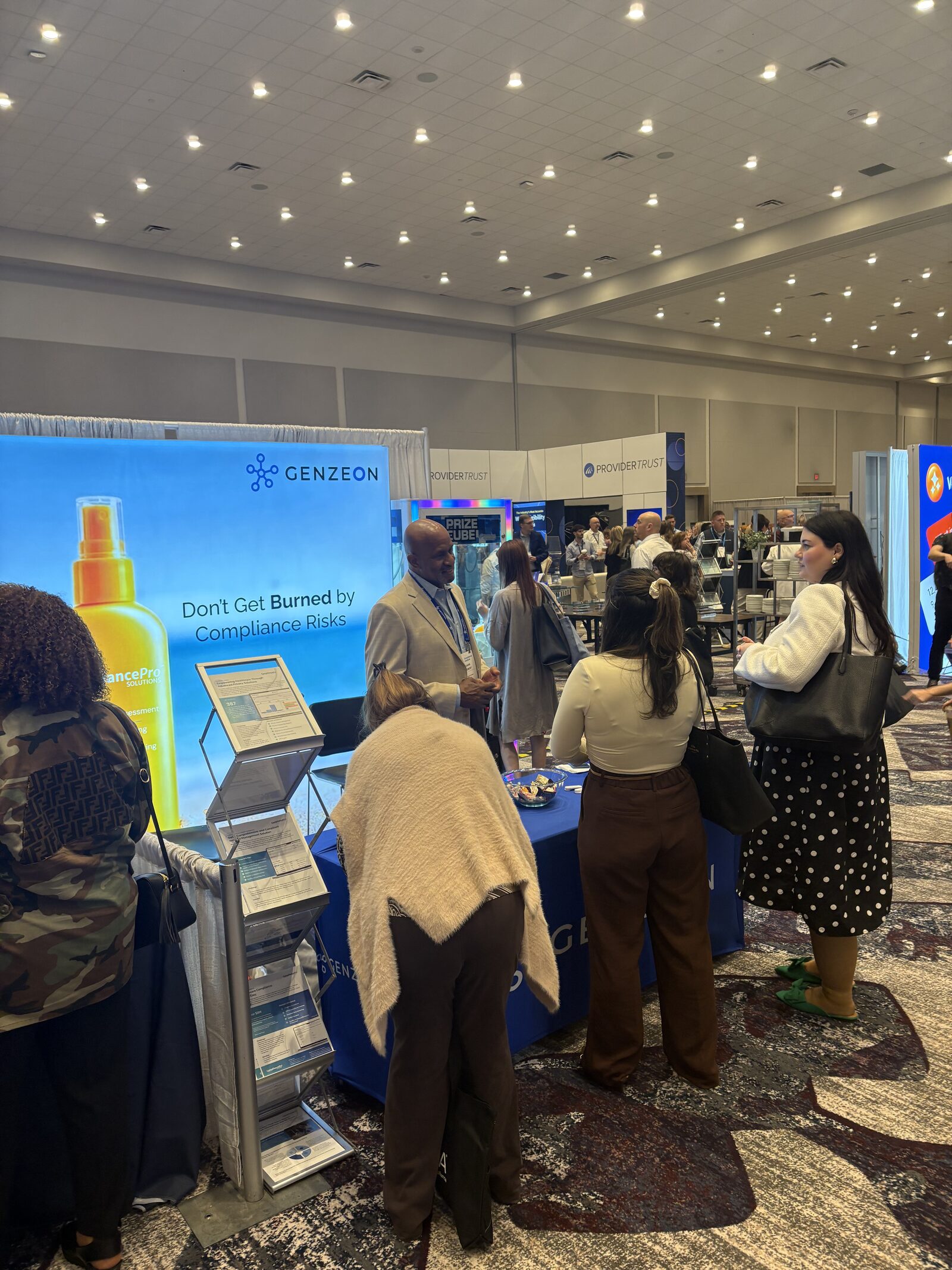 Genzeon Platforms booth at HCCA 2026 with active CPS One demo